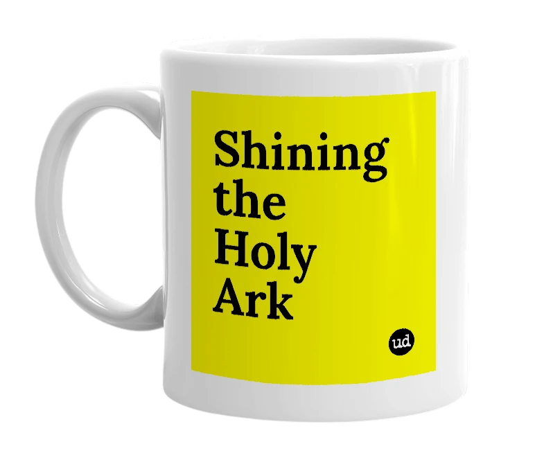 White mug with 'Shining the Holy Ark' in bold black letters