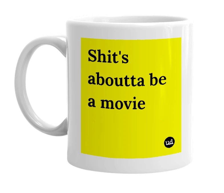 White mug with 'Shit's aboutta be a movie' in bold black letters