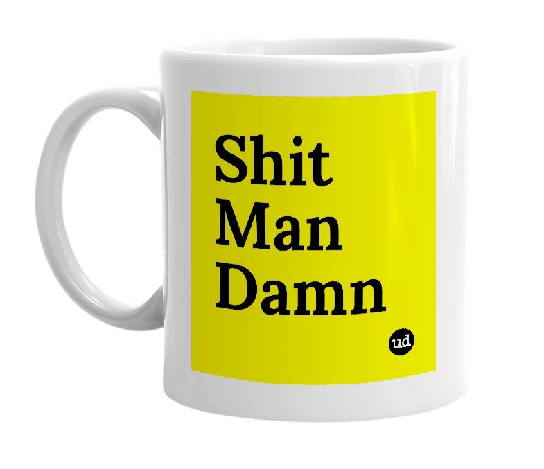 White mug with 'Shit Man Damn' in bold black letters