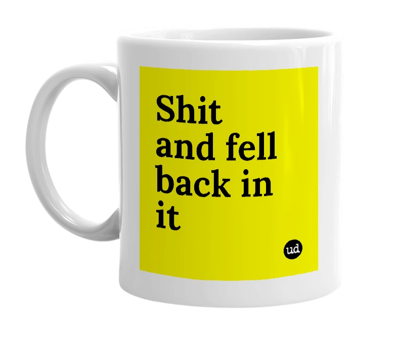 White mug with 'Shit and fell back in it' in bold black letters