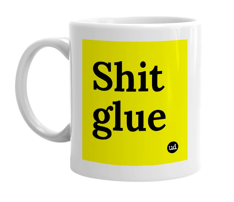 White mug with 'Shit glue' in bold black letters