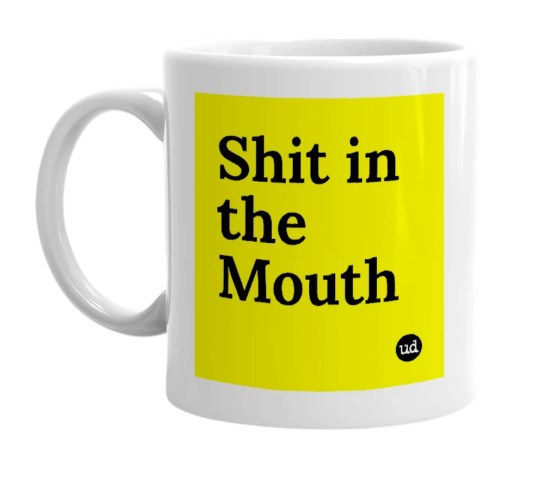 White mug with 'Shit in the Mouth' in bold black letters