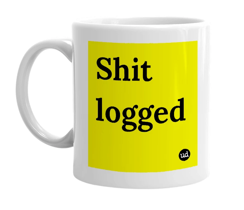 White mug with 'Shit logged' in bold black letters