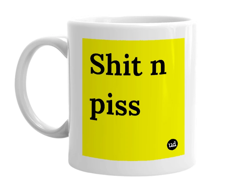 White mug with 'Shit n piss' in bold black letters