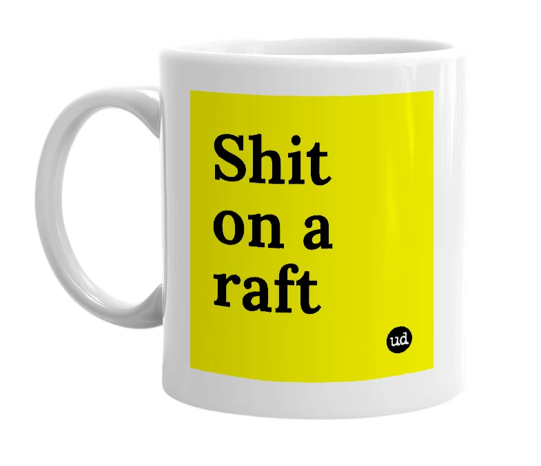 White mug with 'Shit on a raft' in bold black letters