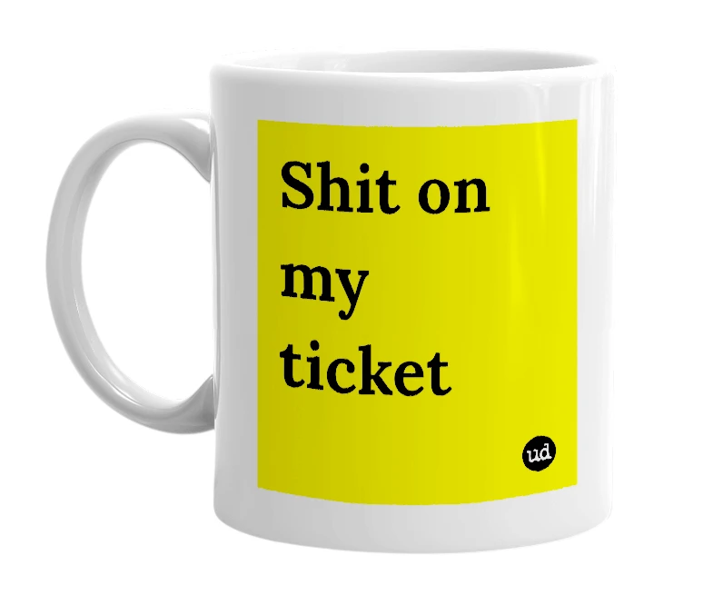 White mug with 'Shit on my ticket' in bold black letters