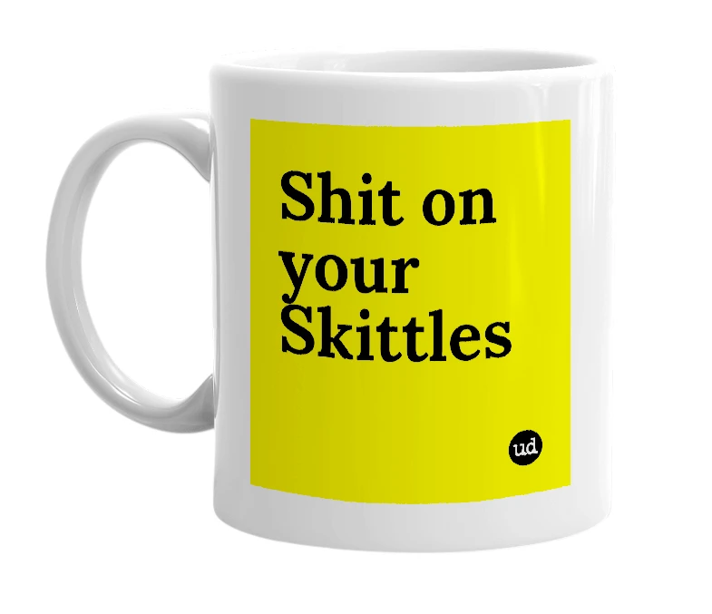 White mug with 'Shit on your Skittles' in bold black letters