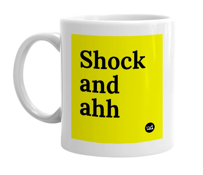 White mug with 'Shock and ahh' in bold black letters