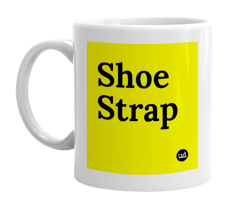 White mug with 'Shoe Strap' in bold black letters