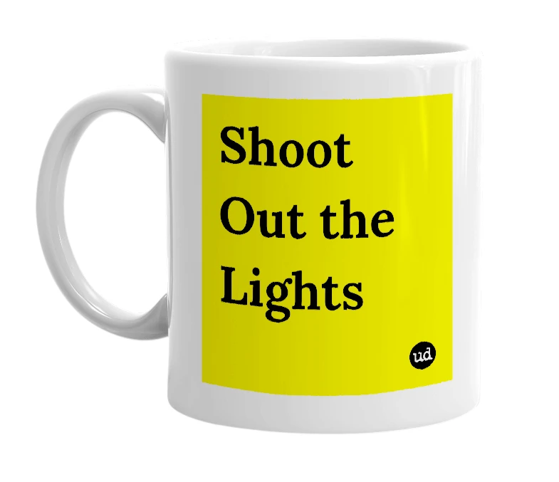White mug with 'Shoot Out the Lights' in bold black letters