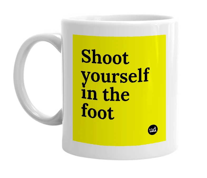 White mug with 'Shoot yourself in the foot' in bold black letters