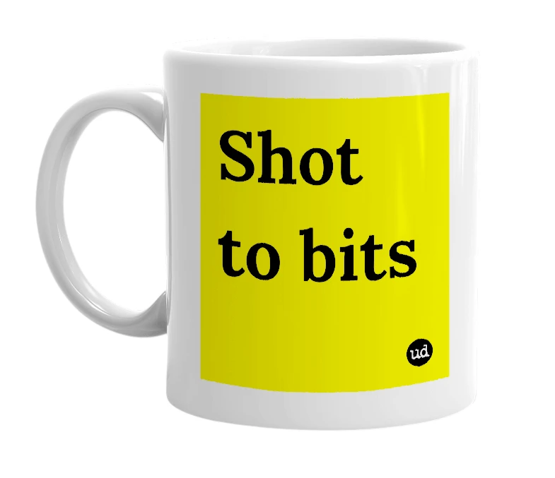 White mug with 'Shot to bits' in bold black letters