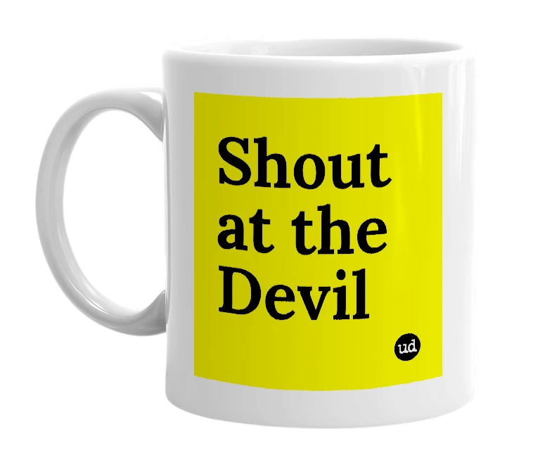 White mug with 'Shout at the Devil' in bold black letters