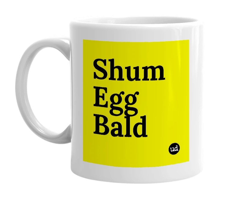 White mug with 'Shum Egg Bald' in bold black letters
