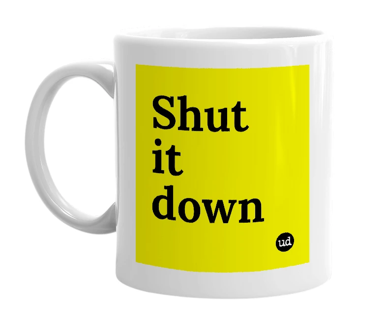 White mug with 'Shut it down' in bold black letters