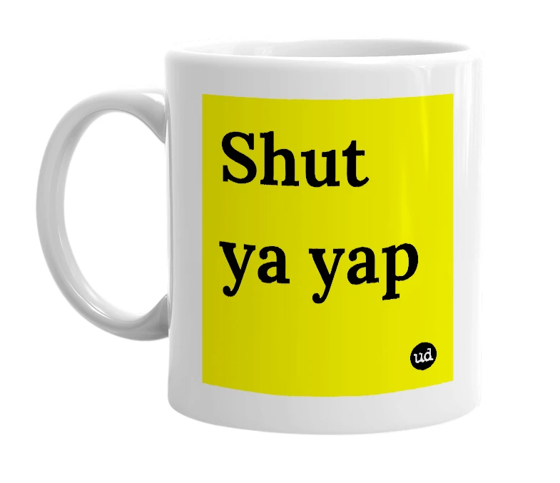 White mug with 'Shut ya yap' in bold black letters