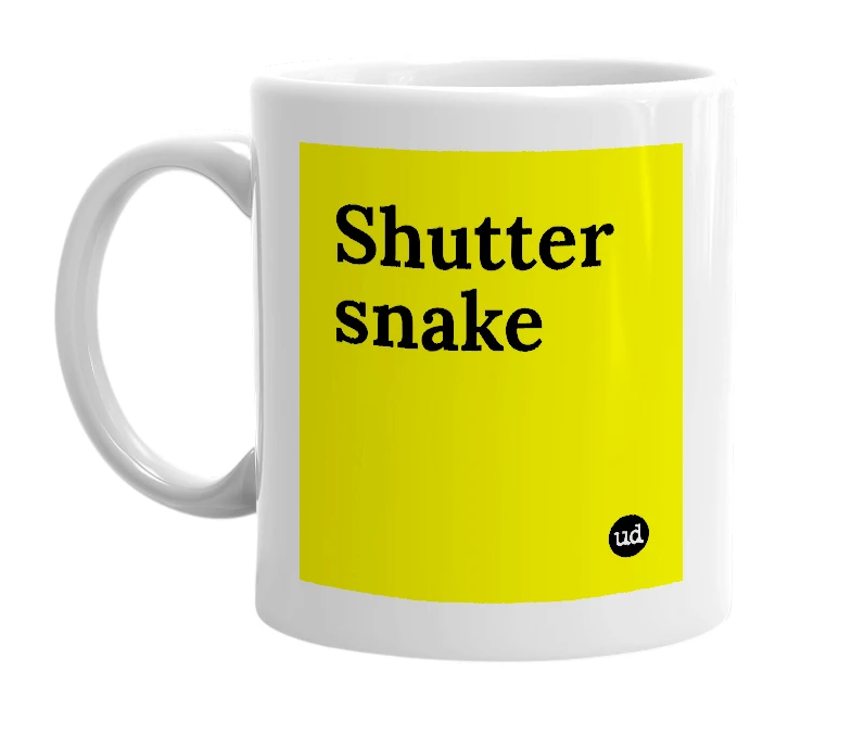 White mug with 'Shutter snake' in bold black letters