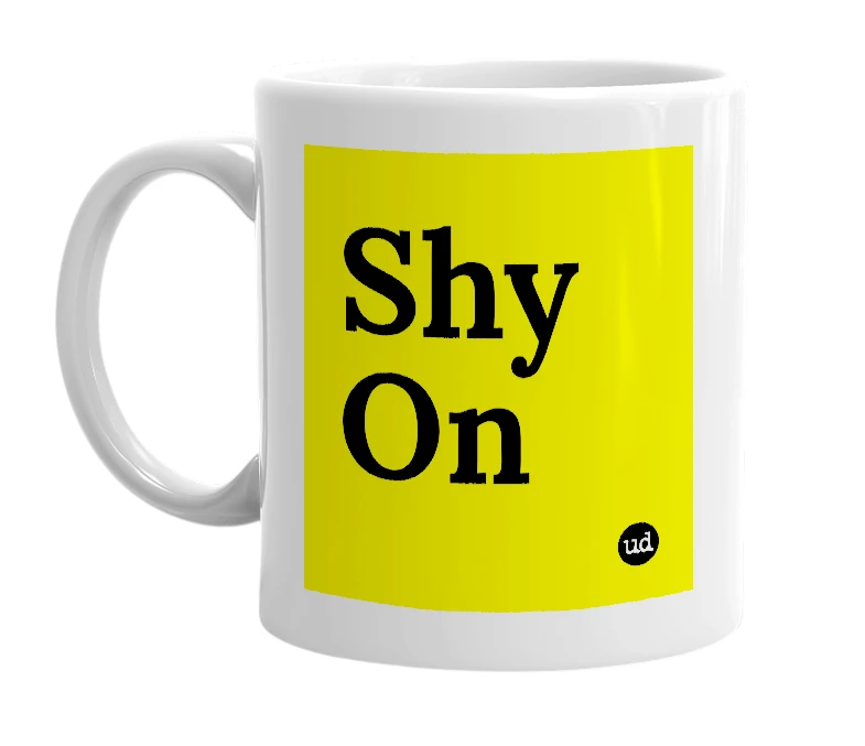 White mug with 'Shy On' in bold black letters