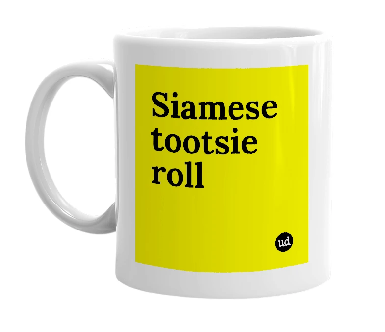 White mug with 'Siamese tootsie roll' in bold black letters
