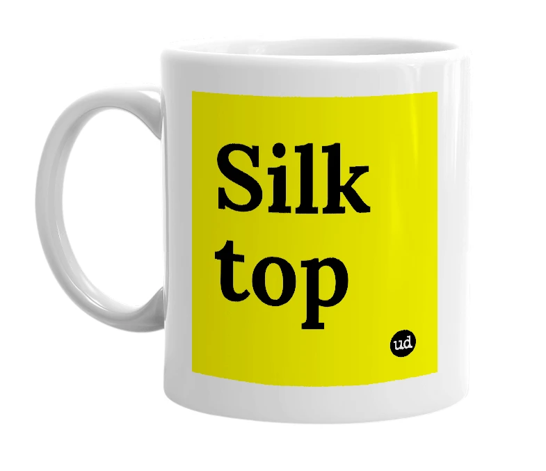 White mug with 'Silk top' in bold black letters