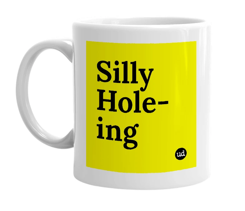 White mug with 'Silly Hole-ing' in bold black letters