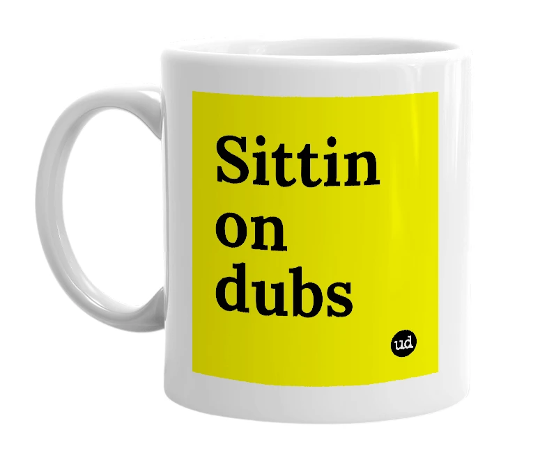 White mug with 'Sittin on dubs' in bold black letters