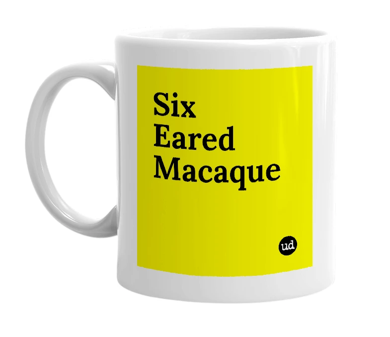 White mug with 'Six Eared Macaque' in bold black letters