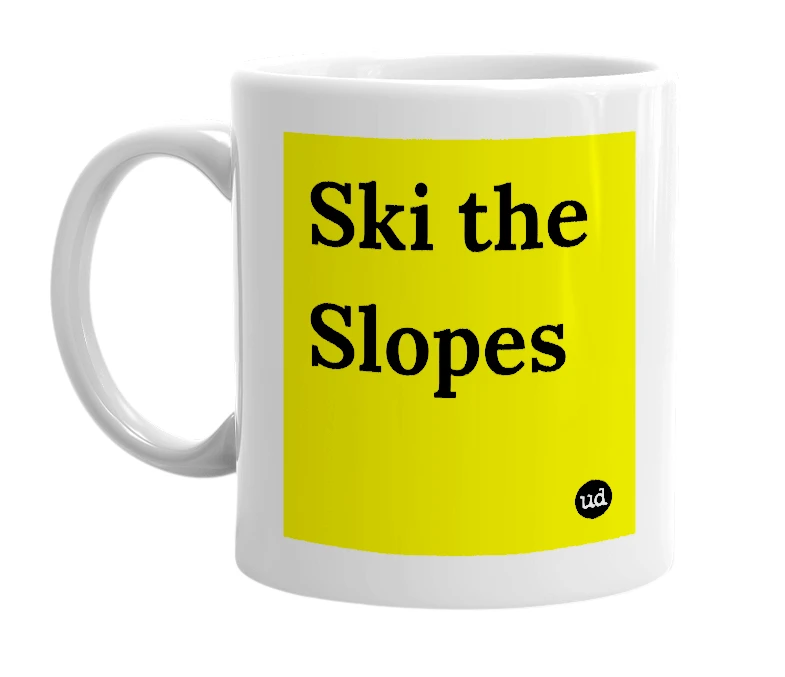 White mug with 'Ski the Slopes' in bold black letters