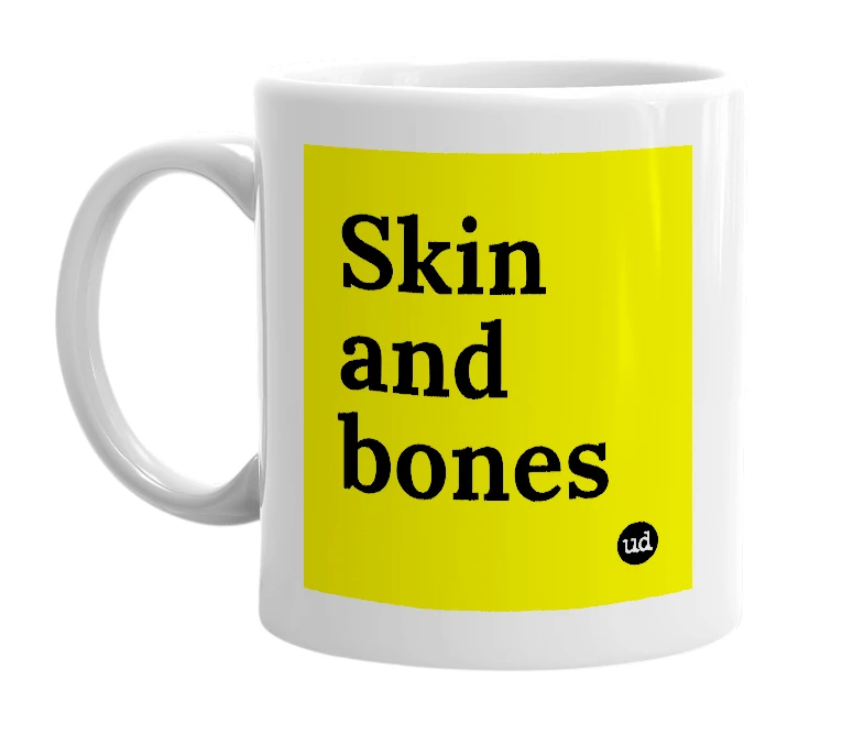 White mug with 'Skin and bones' in bold black letters