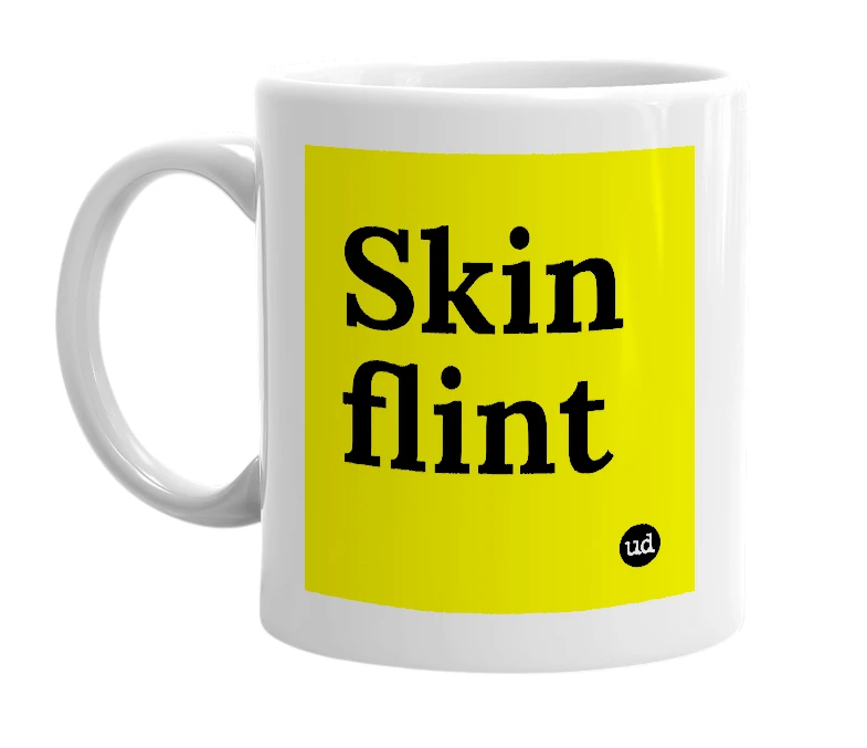 White mug with 'Skin flint' in bold black letters
