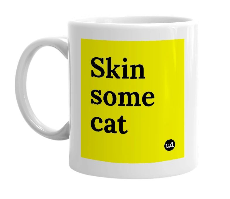 White mug with 'Skin some cat' in bold black letters