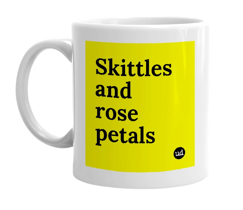 White mug with 'Skittles and rose petals' in bold black letters