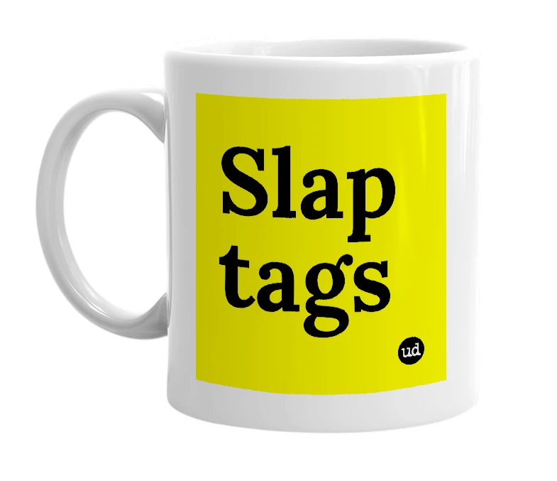 White mug with 'Slap tags' in bold black letters