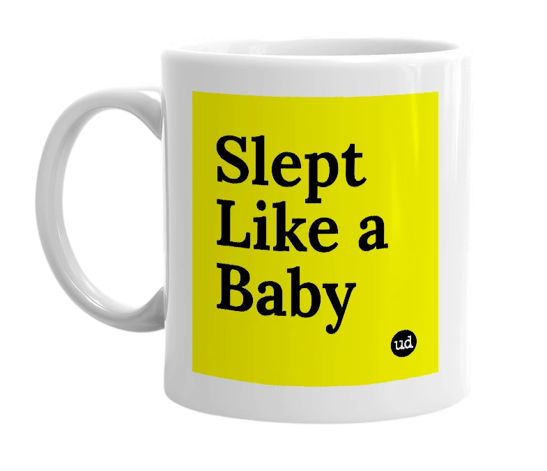 White mug with 'Slept Like a Baby' in bold black letters