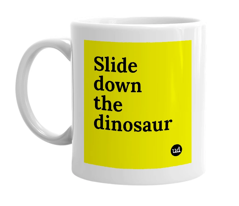 White mug with 'Slide down the dinosaur' in bold black letters