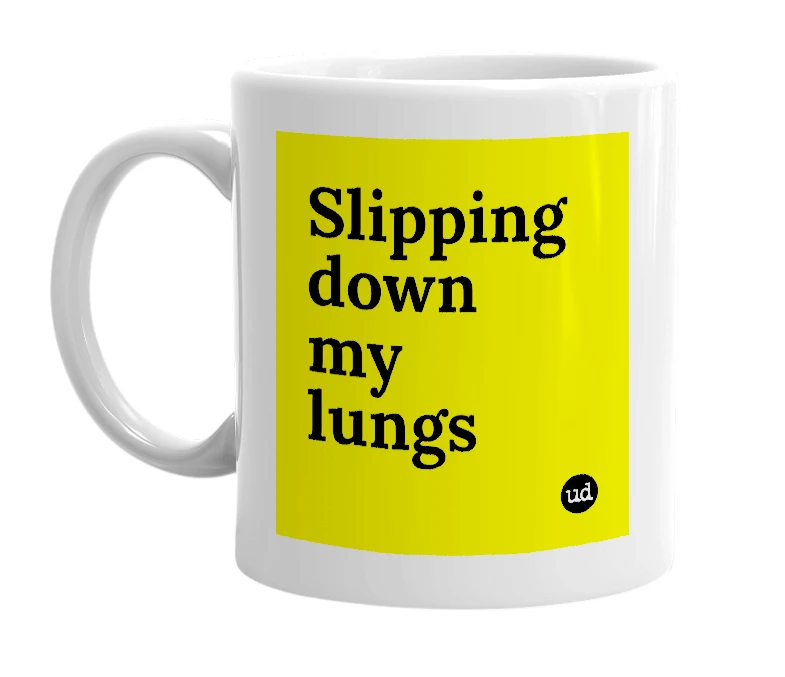 White mug with 'Slipping down my lungs' in bold black letters