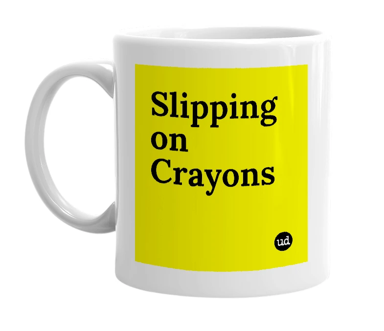 White mug with 'Slipping on Crayons' in bold black letters
