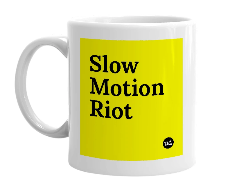 White mug with 'Slow Motion Riot' in bold black letters