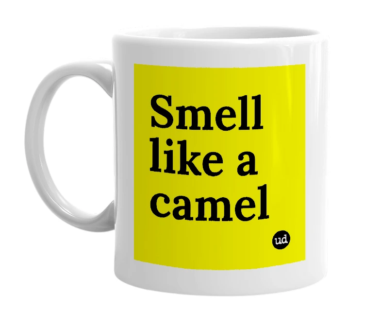 White mug with 'Smell like a camel' in bold black letters