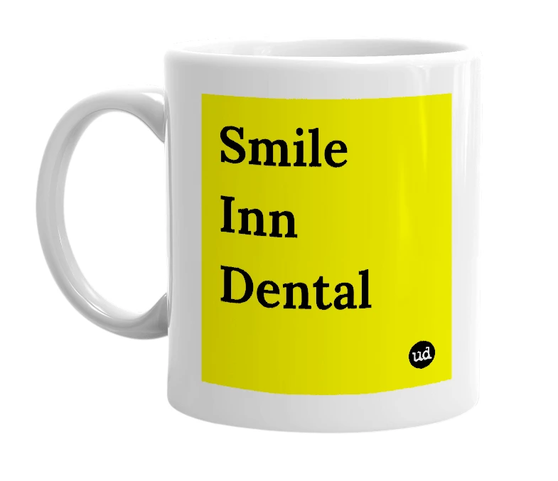 White mug with 'Smile Inn Dental' in bold black letters