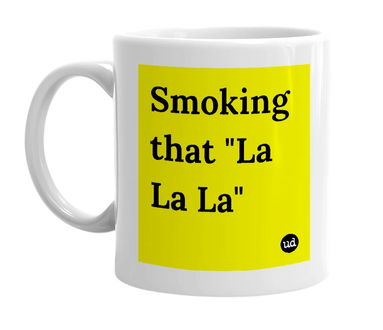 White mug with 'Smoking that "La La La"' in bold black letters