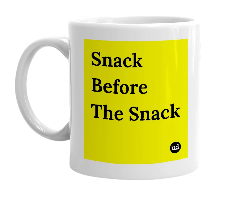 White mug with 'Snack Before The Snack' in bold black letters
