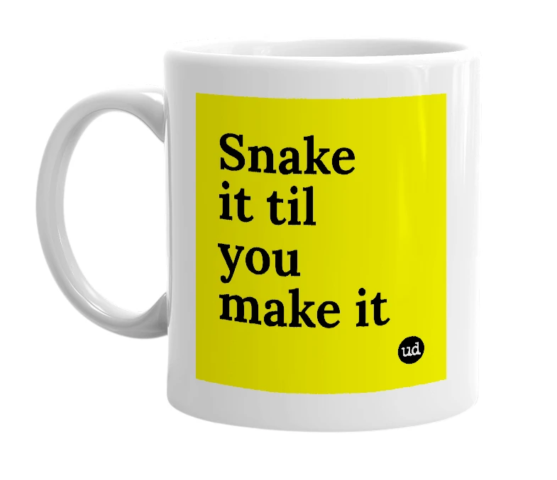 White mug with 'Snake it til you make it' in bold black letters