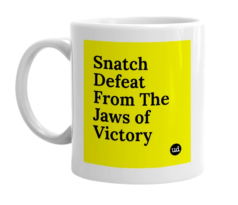 White mug with 'Snatch Defeat From The Jaws of Victory' in bold black letters
