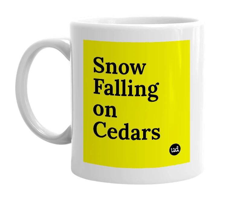 White mug with 'Snow Falling on Cedars' in bold black letters
