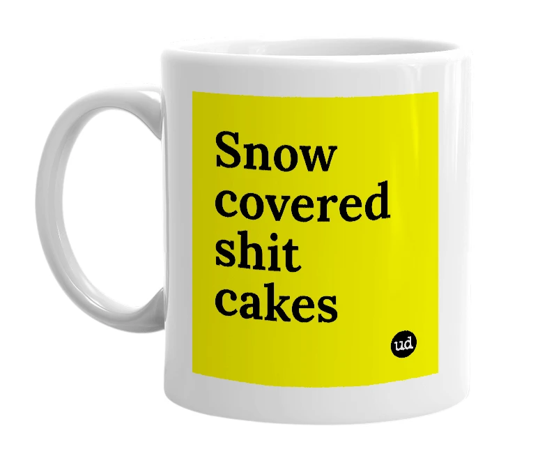 White mug with 'Snow covered shit cakes' in bold black letters