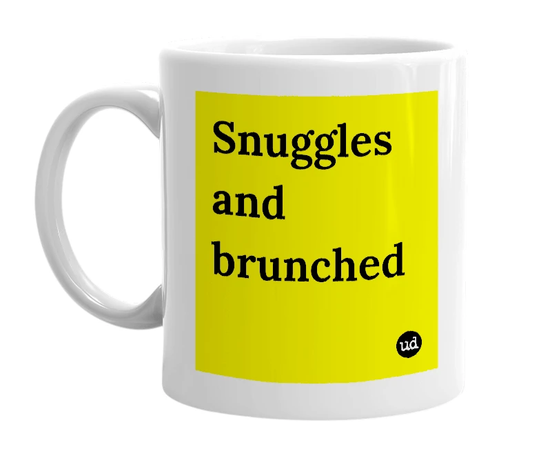 White mug with 'Snuggles and brunched' in bold black letters