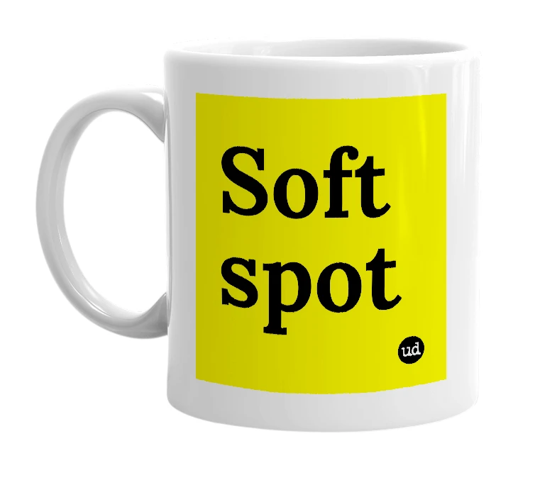 White mug with 'Soft spot' in bold black letters