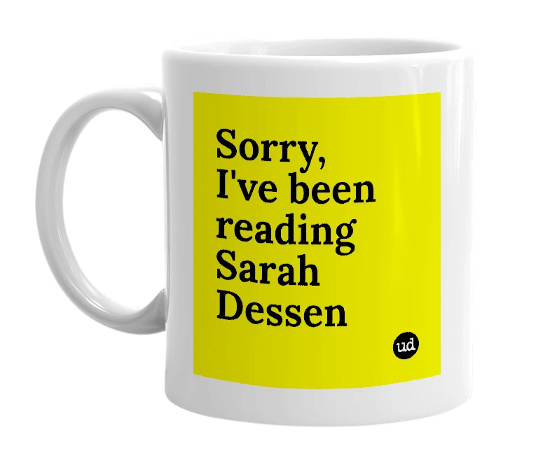 White mug with 'Sorry, I've been reading Sarah Dessen' in bold black letters