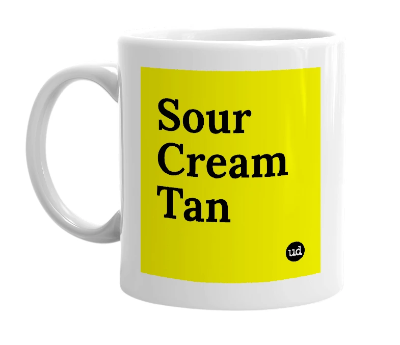 White mug with 'Sour Cream Tan' in bold black letters